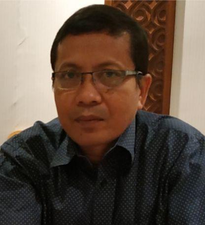Dr. Baharuddin, M.M.